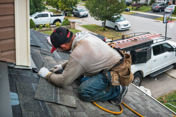 Professional Roof Replacement technician working in North Lawrence, OH